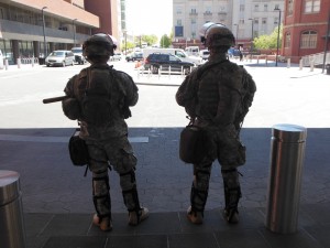 Guardsmen stand at the entrance to Johns Hopkins Hospital. (Anthony C. Hayes)